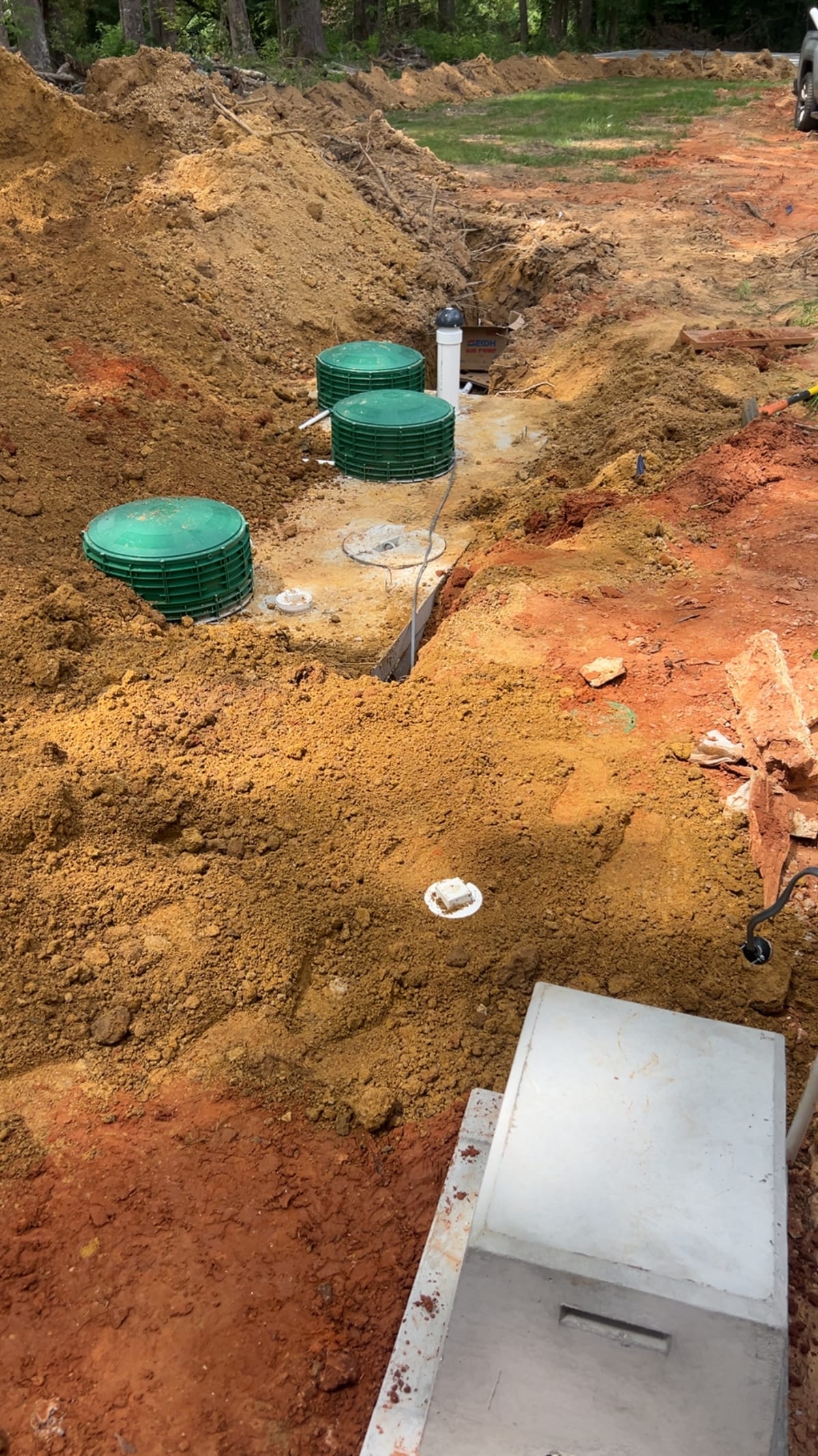 Septic system slab pre-pour at a wooded Northeast Mississippi property.