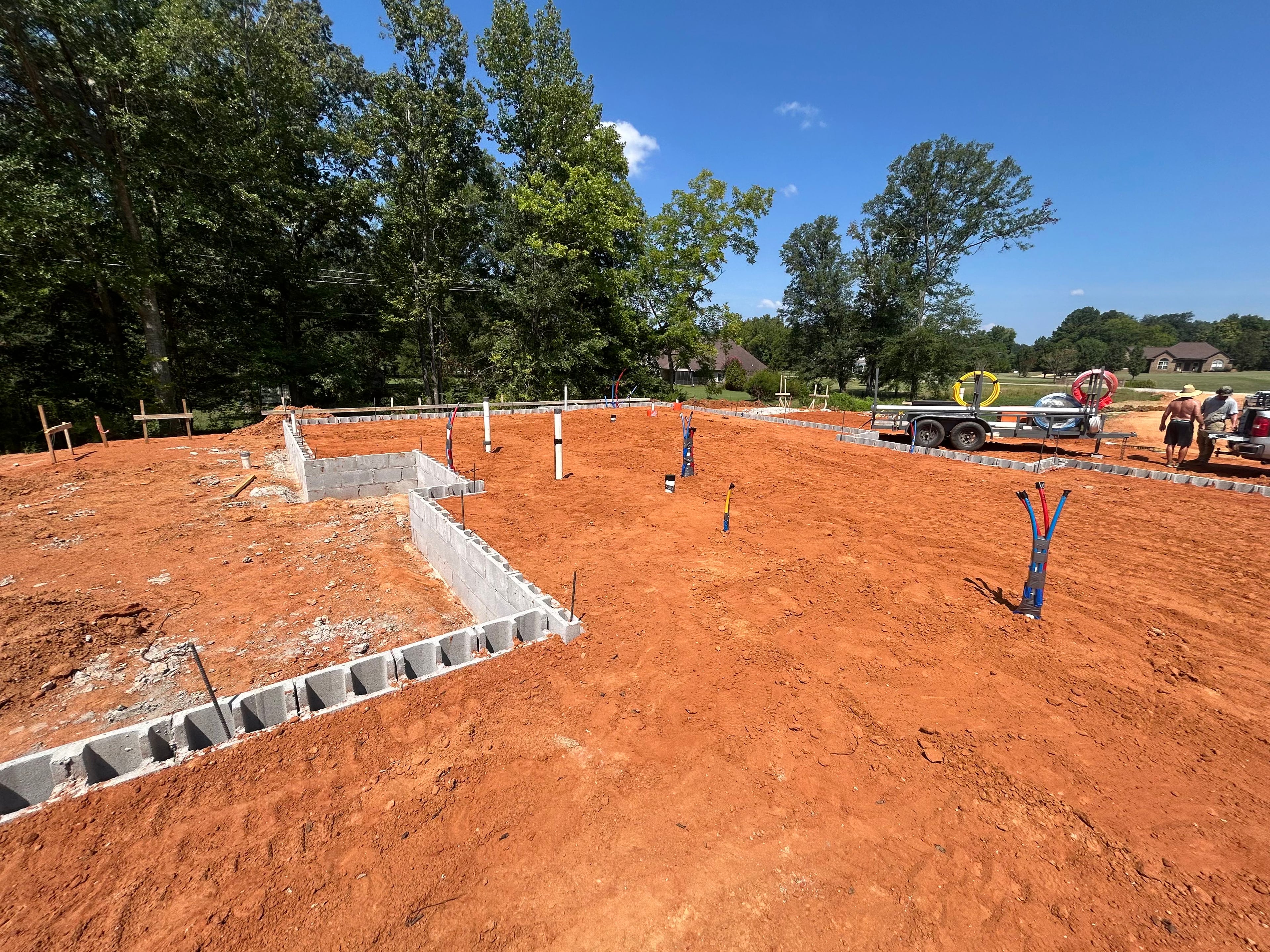 Excavation and foundation plumbing on a Northeast Mississippi new-construction project.
